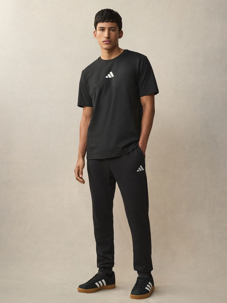 Adidas Men's black essentials jersey joggers